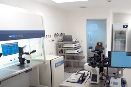 Picture of the interior of a fertility laboratory, representing the capabilities of an IVF fertility center.  The picture shows a white laboratory machine.